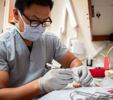 A clinician at work in the practice